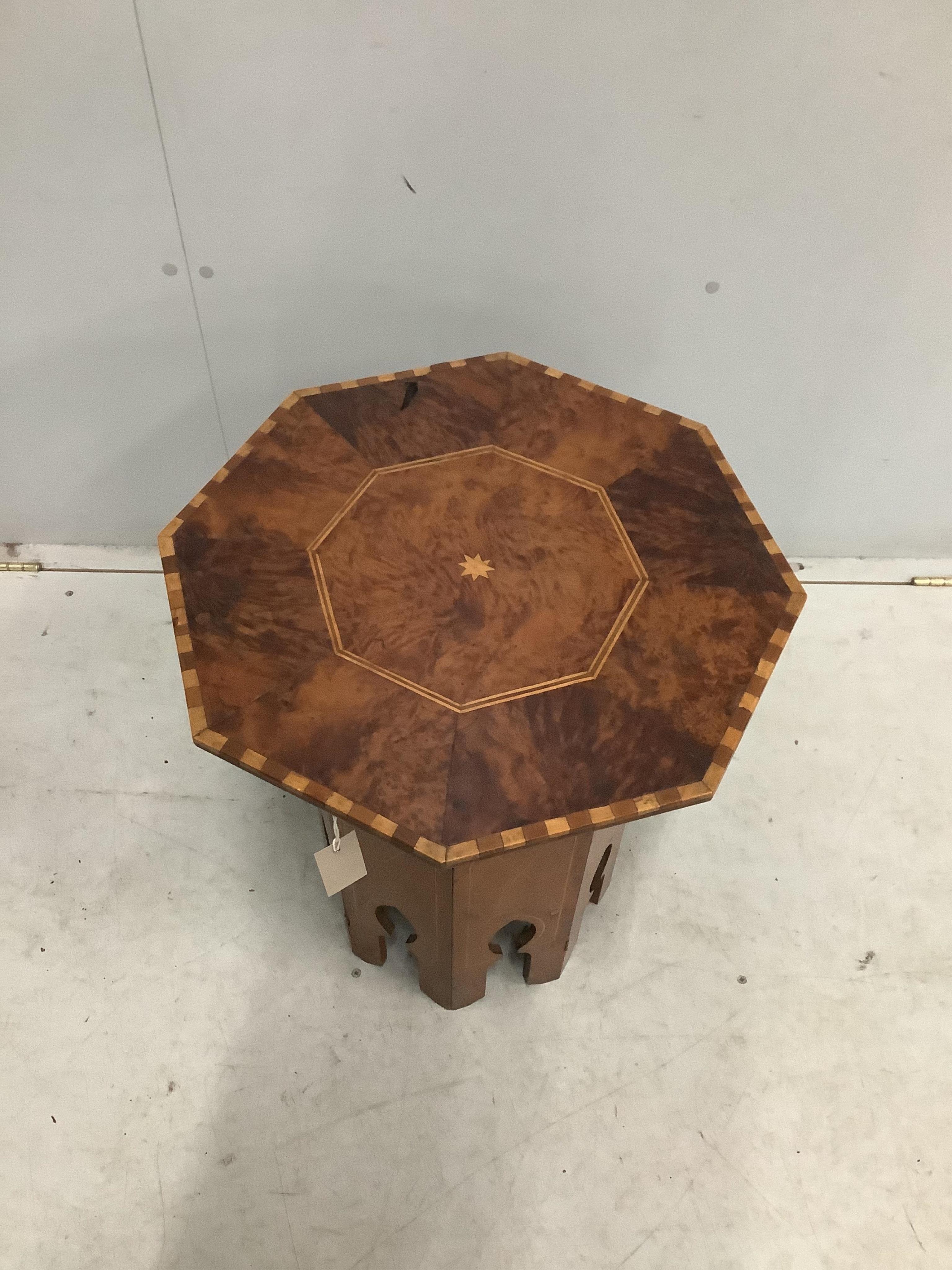 A Moorish style octagonal occasional table, width 48cm, height 57cm. Condition - poor to fair